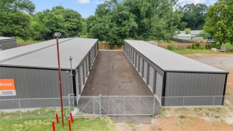 secure storage facility fenced and gated with surveillance cameras